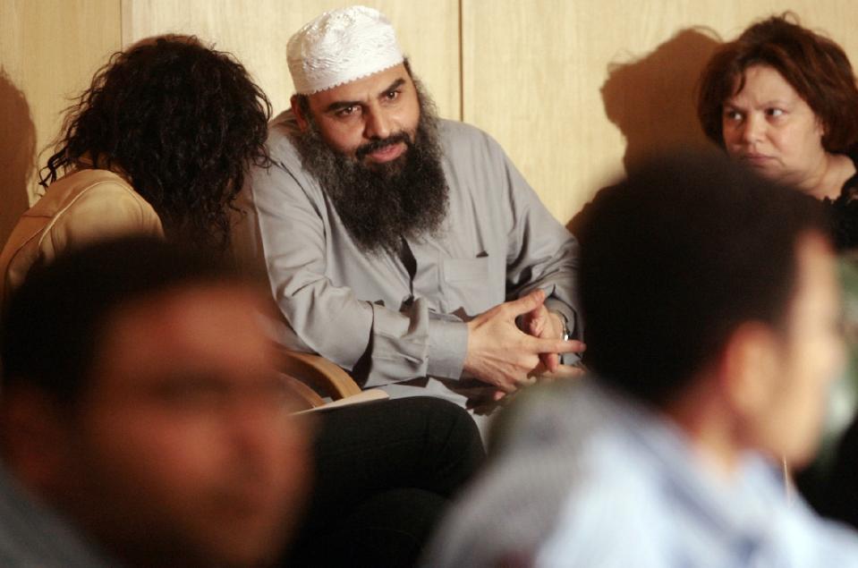 egyptian cleric hassan mustafa osama nasr known as abu omar speaks to a journalist at an amnesty international press conference in cairo april 11 2007 photo afp