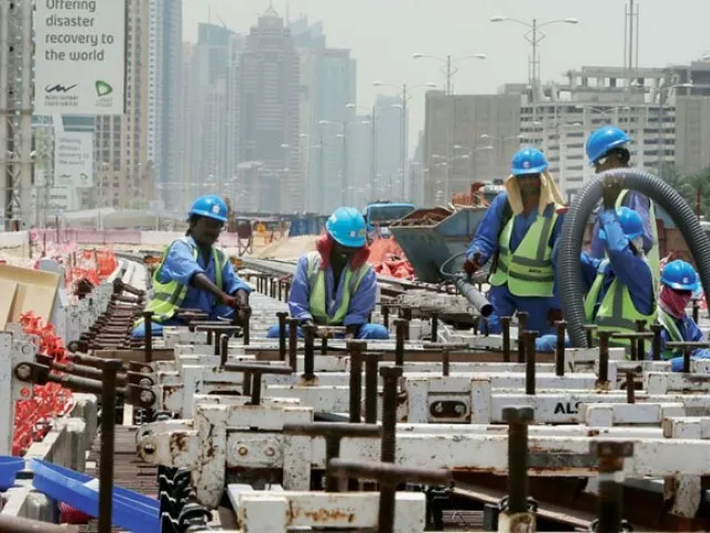 labourers work at the construction site of a track for the dubai metro photo afp labourers work at the construction site of a track for the dubai metro photo afp