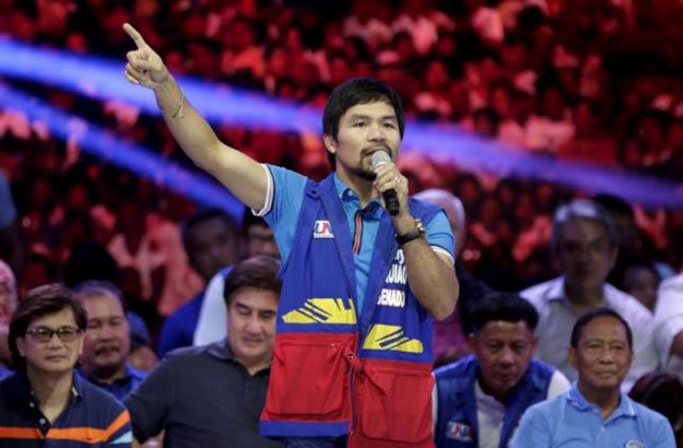 filipino boxer manny pacquiao who is running for senator in the may 2016 national elections speaks to supporters during the start of elections campaigning in mandaluyong city metro manila february 9 2016 photo reuters