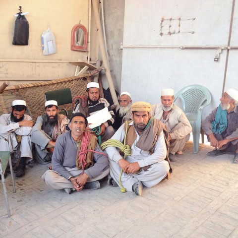 labourers sit at the entrance of peshawar press club photo express labourers sit at the entrance of peshawar press club photo express
