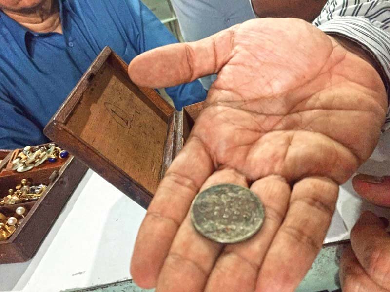 a medal belonging to quaid e azam is removed from the locker photo courtesy a litigant