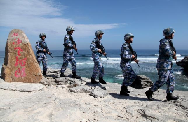 soldiers of china 039 s people 039 s liberation army pla navy patrol at woody island in the paracel archipelago which is known in china as the xisha islands january 29 2016 photo reuters