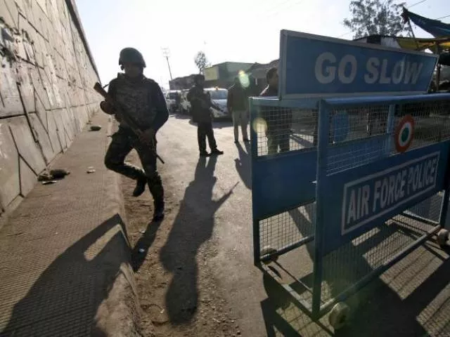 indian security personnel stand guard next to a barricade outside the indian air force iaf base at pathankot in punjab india january 2 2016 photo reuters indian security personnel stand guard next to a barricade outside the indian air force iaf base at pathankot in punjab india january 2 2016 photo reuters