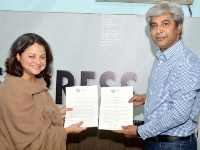 express media group director planning and strategy kamran wajih and ccp coordinator anjum rehman exchanging documents photo express express media group director planning and strategy kamran wajih and ccp coordinator anjum rehman exchanging documents photo express