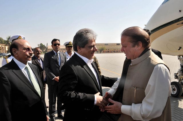 prime minister nawaz sharif is being received by sindh governor dr ishratul ebad khan and sindh chief minister syed qaim ali shah at karachi airport on february 26 2016 photo pid