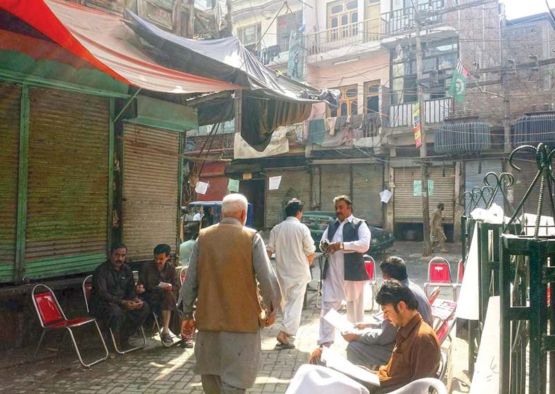 fish traders set up camps outside their shops in ghanta ghar in the city photo express