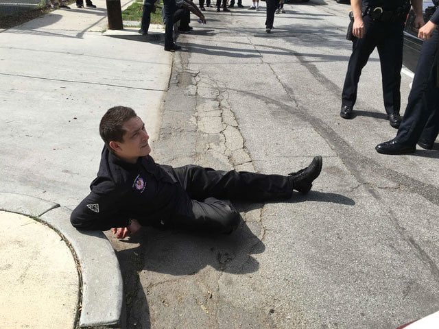 this handout picture obtained courtesy of the center for the study of hate and extremism shows a member of the ku klux klan kkk after being tackled by a counter protester during a kkk rally in anaheim california february 27 2016 three people were stabbed one of them critically and 13 others were arrested when a ku klux klan rally erupted into clashes with counter protesters witnesses and police said photo afp