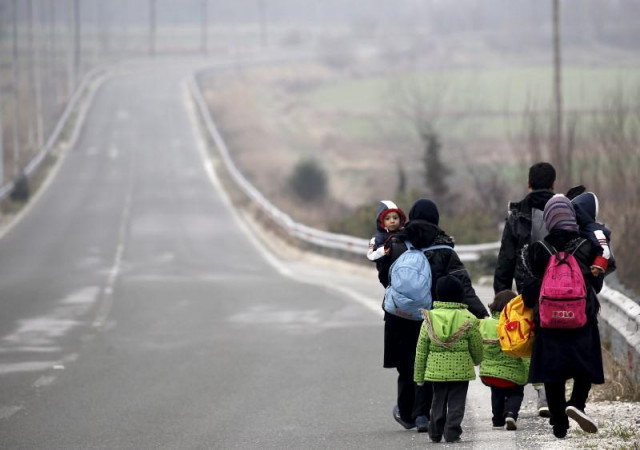 stranded afghan migrants make their way towards the greek macedonian border near the greek village of idomeni february 24 2016 photo reuters stranded afghan migrants make their way towards the greek macedonian border near the greek village of idomeni february 24 2016 photo reuters