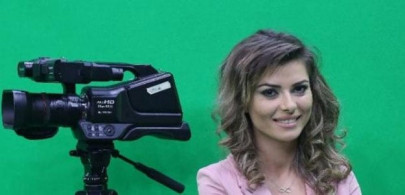 albanian newsreaders strip down to boost audience
