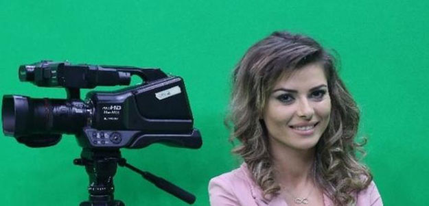 presenter greta hoxhaj 24 poses prior appearing on a news programme on zjarr tv fire tv in tirana photo afp