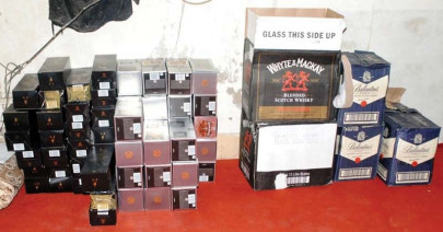 dishonouring the uniform police officer caught smuggling liquor