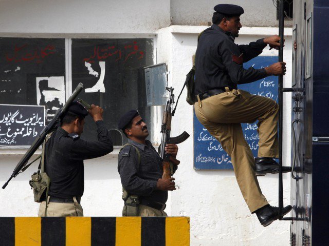 four suspects were arrested during a search operation in the pakistan bazaar area of orangi town photo reuters