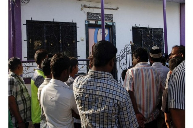people gather outside the residence of indian man hasnain warekar in thane outskirts of mumbai india sunday feb 28 2016 photo afp people gather outside the residence of indian man hasnain warekar in thane outskirts of mumbai india sunday feb 28 2016 photo afp
