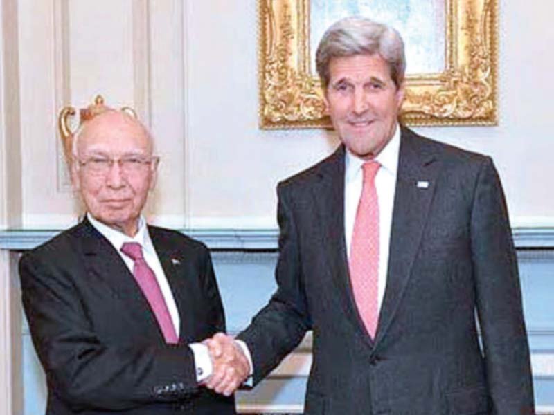 john kerry shakes hands with sartaj aziz during the annual pak us strategic dialogue in washington photo app