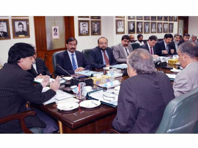 interior minister chaudhry nisar chairing a high level meeting at interior ministry photo inp