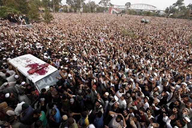 life in rawalpindi came to a standstill as thousands turn out for funeral schools remained closed metro suspended photo reuters