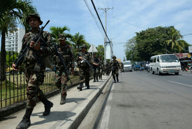 philippine soldiers patrol the streets in zamboanga on southern island of mindanao on september 21 2013 photo afp philippine soldiers patrol the streets in zamboanga on southern island of mindanao on september 21 2013 photo afp