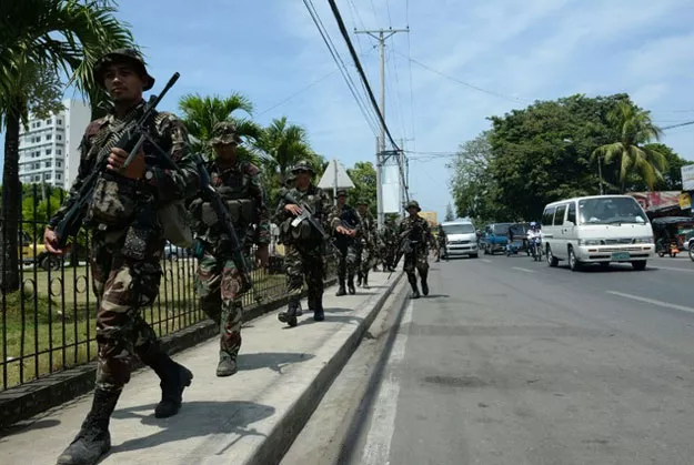 philippine soldiers patrol the streets in zamboanga on southern island of mindanao on september 21 2013 photo afp philippine soldiers patrol the streets in zamboanga on southern island of mindanao on september 21 2013 photo afp