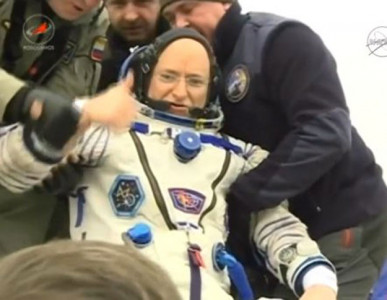international space station s crew returns to earth after one year