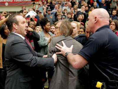 hecklers disrupt trump rally photographer shoved to the ground hecklers disrupt trump rally photographer shoved to the ground