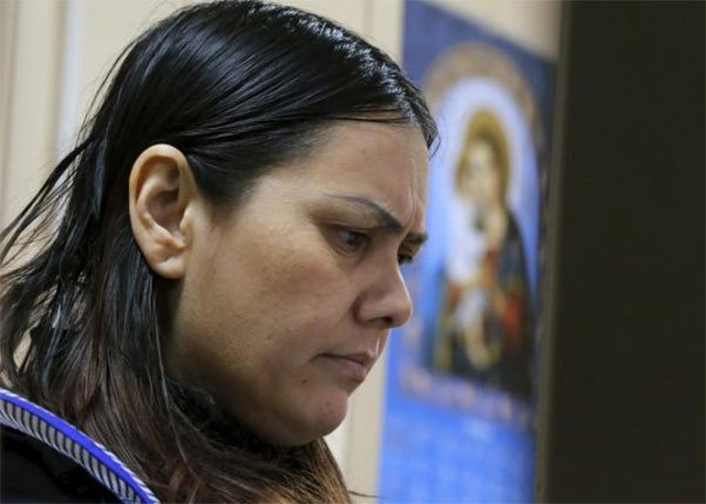 gyulchekhra bobokulova a nanny suspected of murdering a child in her care looks on inside a defendants 039 cage as she attends a court hearing in moscow russia march 2 2016 photo reuters