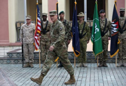 new nato led coalition commander inherits raging war in afghanistan