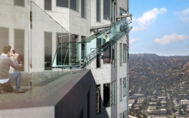 an artist rendering of the 039 skyslide 039 attraction an outdoor glass slide positioned close to 1 000 feet above downtown los angeles california is shown in this image released by oue skyspace on march 2 2016 reuters an artist rendering of the 039 skyslide 039 attraction an outdoor glass slide positioned close to 1 000 feet above downtown los angeles california is shown in this image released by oue skyspace on march 2 2016 reuters