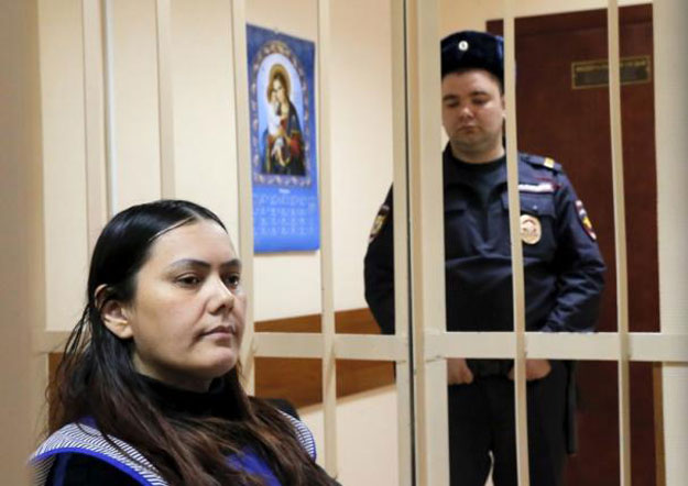 gulchekhra gyulchekhra bobokulova a nanny suspected of murdering a child in her care sits inside a defendants 039 cage as she attends a court hearing in moscow russia march 2 2016 reuters