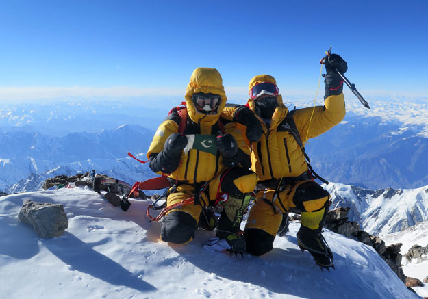 in this photograph taken on february 26 2016 released by marianna zanatta sports marketing management shows italian climber simone moro r and pakistani climber ali sadpara celebrate after scaling the peak of nanga parbat which is known as quot killer mountain quot and second highest peak after k2 photo afp
