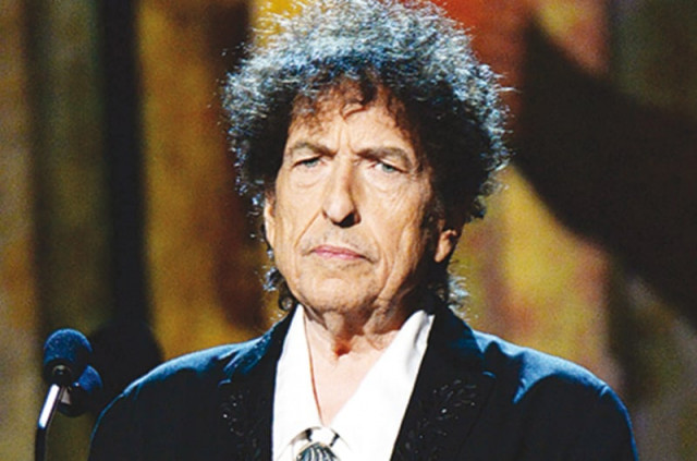 dylan is known for writing evergreen tracks like all along the watch tower knockin on heaven s door and the times they are a changing photo file dylan is known for writing evergreen tracks like all along the watch tower knockin on heaven s door and the times they are a changing photo file