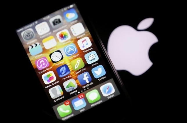 an apple iphone is pictured next to the logo of apple in bordeaux southwestern france february 26 2016 photo reuters