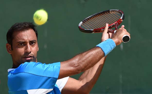 aqeel khan returns the ball to china 039 s ze zhang during their davis cup world asia oceania zone group l first round single tennis match in colombo on march 4 2016 photo afp