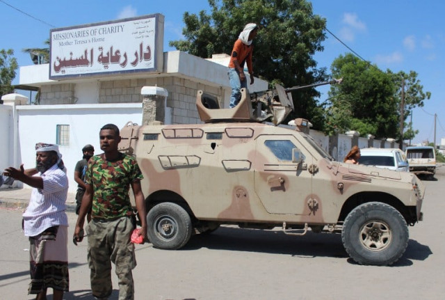 yemeni pro government fighters loyal to exiled yemeni president abedrabbo mansour hadi gather outside an elderly care home in yemen 039 s main southern city of aden after it was attacked by gunmen on march 4 2016 photo afp yemeni pro government fighters loyal to exiled yemeni president abedrabbo mansour hadi gather outside an elderly care home in yemen 039 s main southern city of aden after it was attacked by gunmen on march 4 2016 photo afp