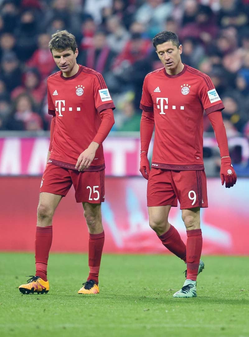 bayern suffered only their second defeat of the season against mainz on wednesday and could see their lead trimmed to just two points if they also lose against dortmund photo afp