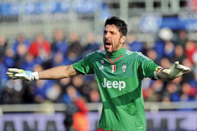 buffon sets record as juve continue title march