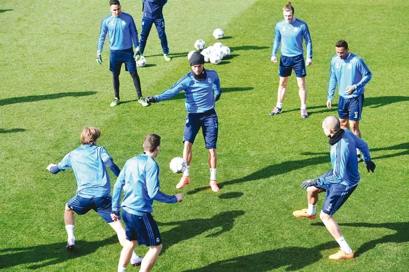 ronaldo c and teammates take part in a training session at real madrid sport city on the eve of their uefa champions league football match the portuguese needs to be in top form if real are to claim an 11th champions league this season photo afp ronaldo c and teammates take part in a training session at real madrid sport city on the eve of their uefa champions league football match the portuguese needs to be in top form if real are to claim an 11th champions league this season photo afp