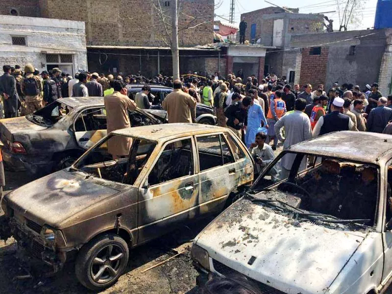 security officials inspect the site of a suicide bombing in shabqadar photo sameer raziq express security officials inspect the site of a suicide bombing in shabqadar photo sameer raziq express