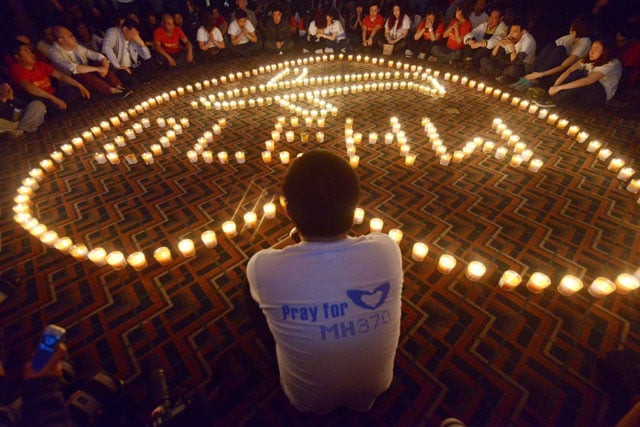 this file photo taken on april 08 2014 shows chinese relatives of passengers on the missing malaysia airlines flight mh370 taking part in a prayer service at the metro park hotel in beijing malaysia and australia said they remained quot hopeful quot of solving the mystery of flight mh370 as the second anniversary of the plane 039 s disappearance arrived on march 8 2016 with no end in sight for devastated families photo afp