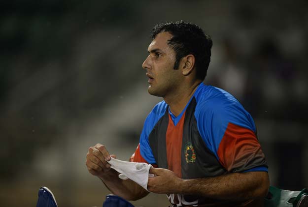 this photo taken on february 29 2016 shows afghanistan batsman mohammad nabi taking part in a practice session at the shaeed vijay singh pathik sport complex in greater noida on the outskirts of the indian capital new delhi photo afp