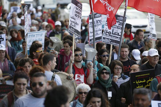 palestinian and israeli activists take part in a demonstration calling for a better future for both people and ahead of the annual international women 039 s day in the west bank city of bethlehem march 4 2016 photo reuters