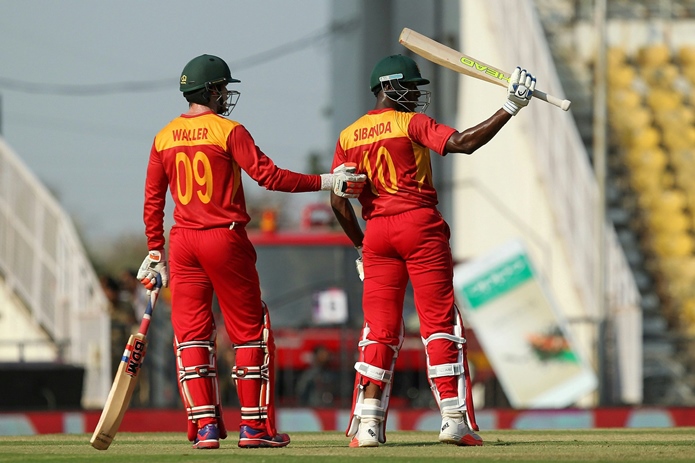 vusi sibanda acknowledges the crowd after scoring a half century during the opening match of world t20 against hong kong in nagpur on march 8 2016 photo afp