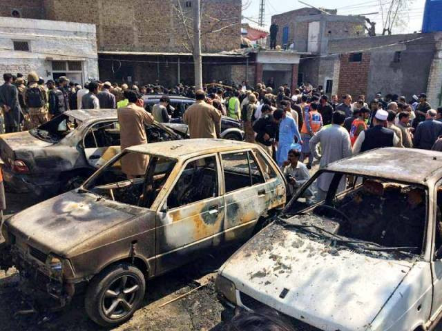 security officials inspect the site of a suicide bombing in shabqadar photo sameer raziq express security officials inspect the site of a suicide bombing in shabqadar photo sameer raziq express