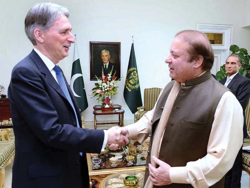 pm nawaz shakes hands with the british foreign secretary photo app