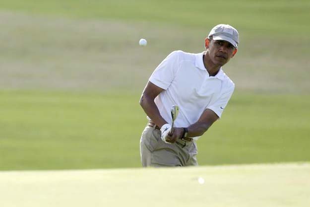 us president barack obama plays a shot to the 18th green as he finishes a round of golf with friends at the mid pacific country club in kailua hawaii in this december 28 2015 file photo reuters