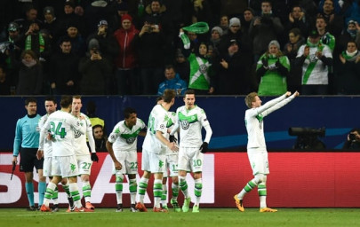 wolfsburg dream on after reaching champions league quarter final