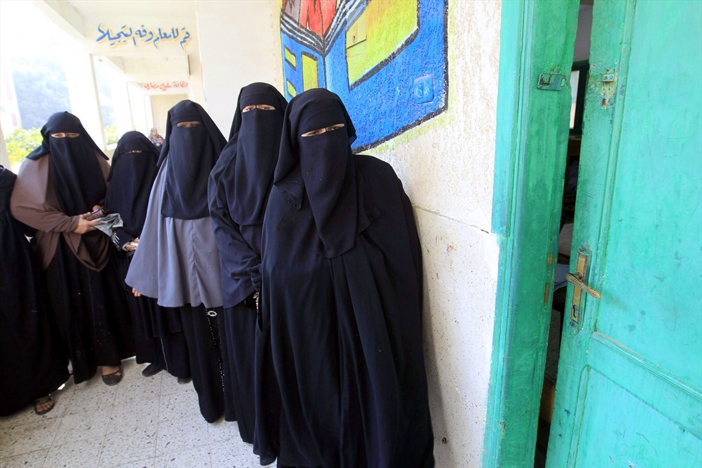niqab clad women line up to vote during a 2014 election photo afp