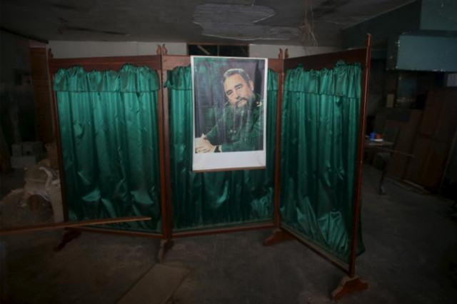 a picture of former cuban president fidel castro is seen inside a private shop under refurbishment in havana february 24 2016 photo reuters a picture of former cuban president fidel castro is seen inside a private shop under refurbishment in havana february 24 2016 photo reuters