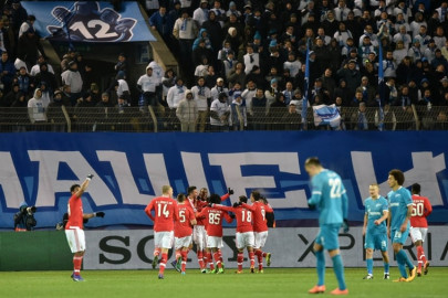 benfica stun zenit to reach champions league quarter final