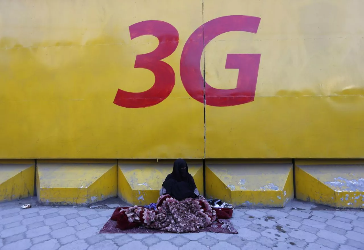 an afghan woman begs under a 3g logo in kabul afghanistan march 8 2016 photo reuters an afghan woman begs under a 3g logo in kabul afghanistan march 8 2016 photo reuters