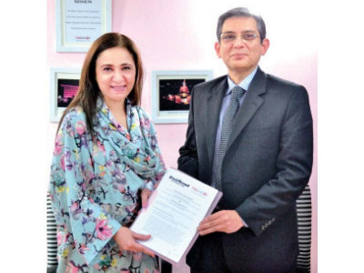 fighting breast cancer gul ahmed and pink ribbon sign mou